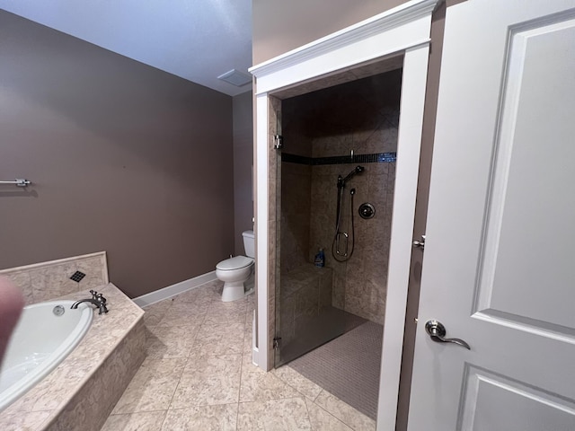 full bath with a bath, baseboards, a shower stall, tile patterned floors, and toilet