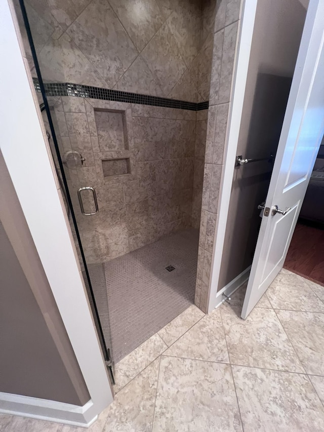 full bathroom featuring a stall shower