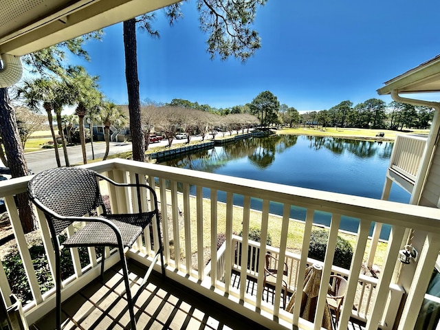 balcony featuring a water view