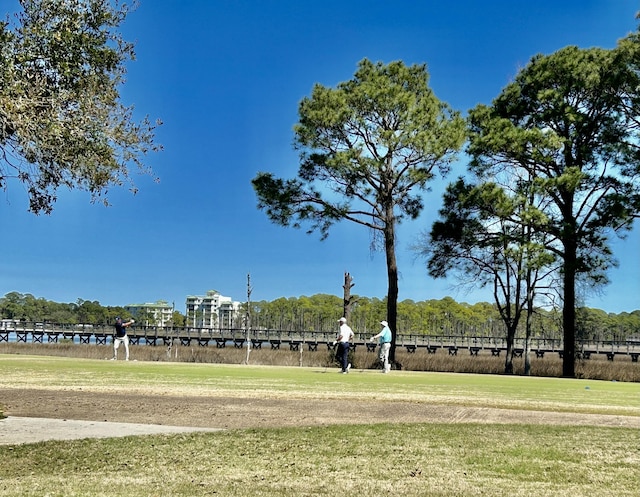 surrounding community featuring a yard