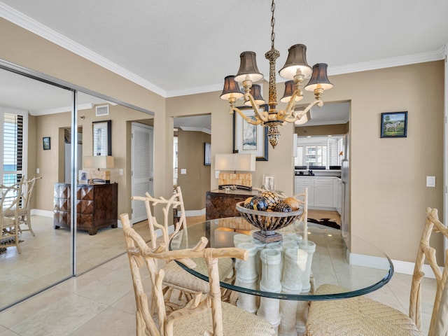 dining area with a healthy amount of sunlight, visible vents, ornamental molding, and a chandelier