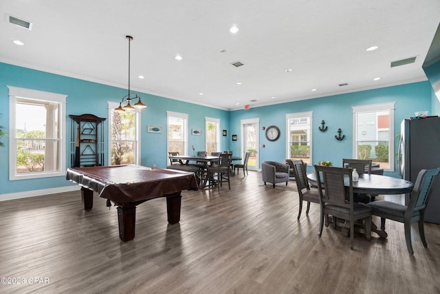 recreation room with recessed lighting, visible vents, and wood finished floors