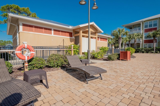 view of patio with fence