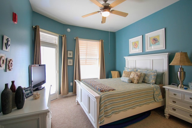 bedroom featuring ceiling fan and light colored carpet