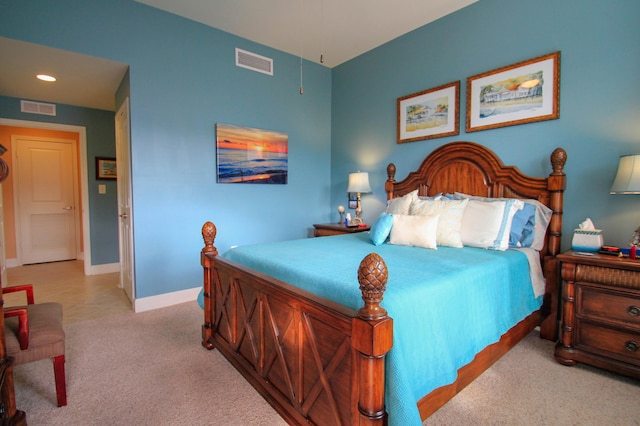 carpeted bedroom with recessed lighting, visible vents, and baseboards