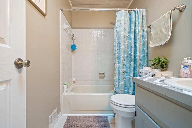 bathroom featuring visible vents, shower / tub combo with curtain, vanity, and toilet