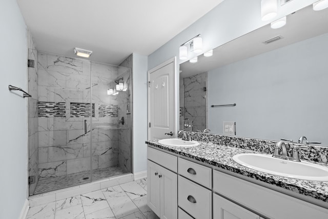 full bathroom featuring visible vents, marble finish floor, a sink, and a marble finish shower