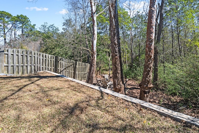 view of yard with fence