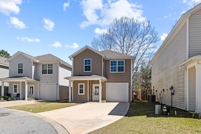 view of front facade featuring concrete driveway, fence, a garage, cooling unit, and a front lawn