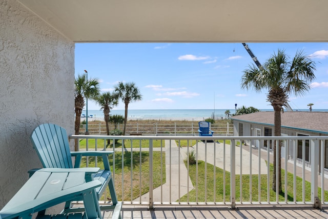 balcony featuring a water view