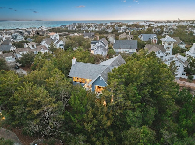 birds eye view of property with a residential view