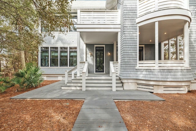 doorway to property featuring a balcony