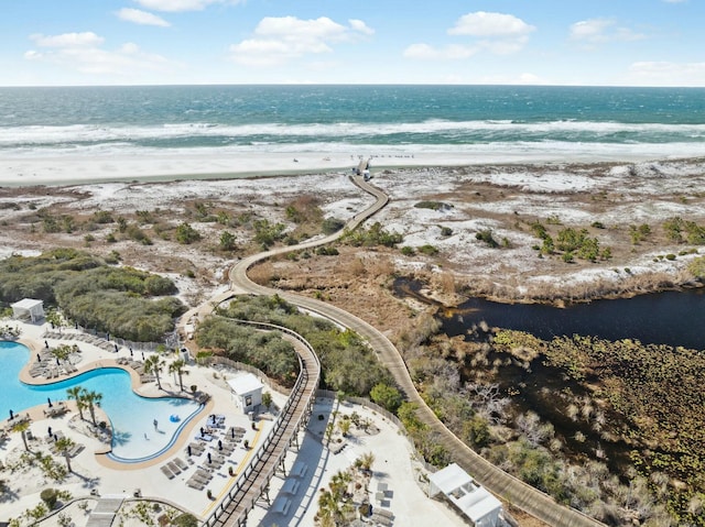 bird's eye view with a beach view and a water view