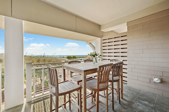 balcony featuring outdoor dining area