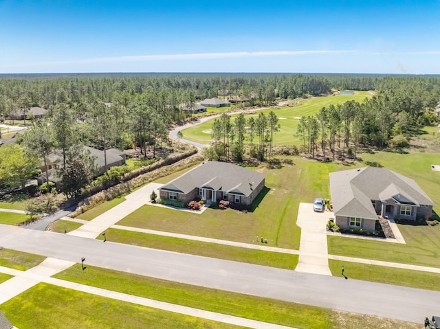 drone / aerial view with a view of trees