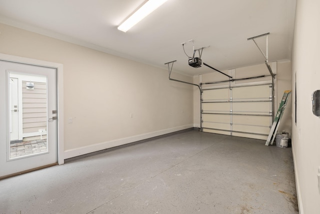 garage with a garage door opener and baseboards