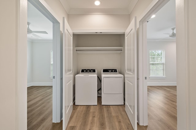 washroom with washing machine and clothes dryer, ornamental molding, and ceiling fan