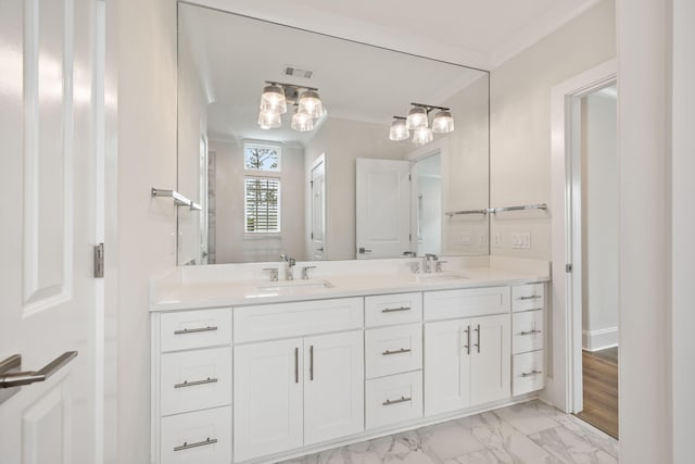 full bathroom featuring visible vents, marble finish floor, a sink, crown molding, and double vanity