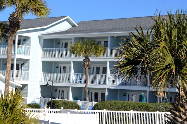 view of property featuring a fenced front yard