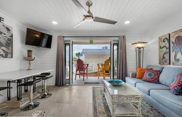 living room featuring a ceiling fan, wood ceiling, and recessed lighting