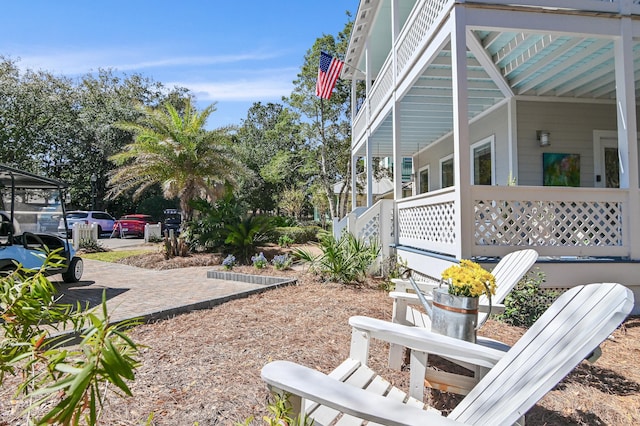 view of yard featuring a porch