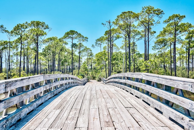 surrounding community with a wooden deck