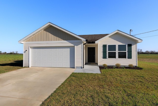 ranch-style home with a garage, concrete driveway, a shingled roof, and a front yard