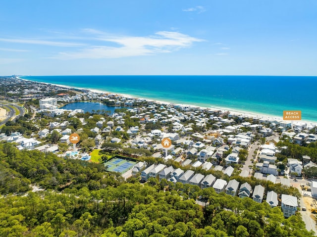 birds eye view of property with a residential view and a water view