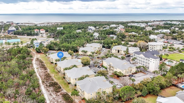 bird's eye view featuring a water view and a residential view