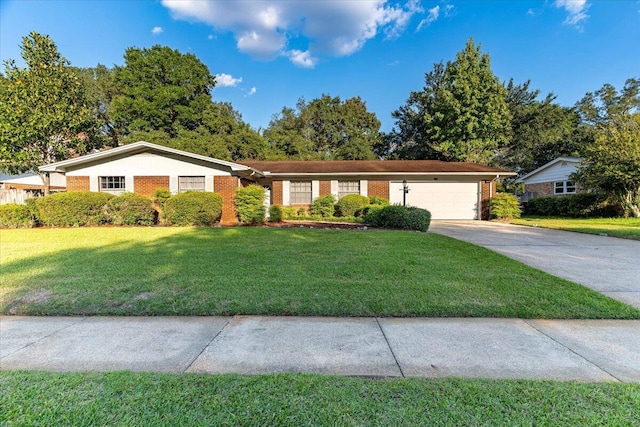 ranch-style house featuring an attached garage, a front lawn, concrete driveway, and brick siding