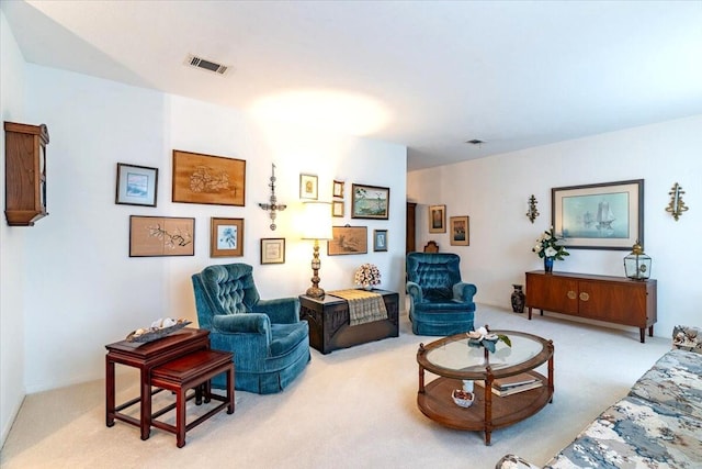 sitting room featuring carpet and visible vents