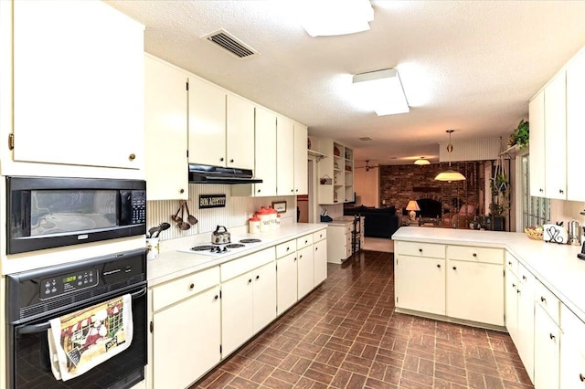 kitchen with visible vents, open floor plan, under cabinet range hood, black appliances, and brick patterned floor