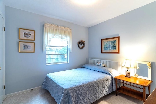 bedroom featuring baseboards