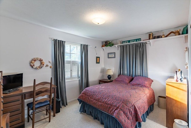 bedroom with light carpet