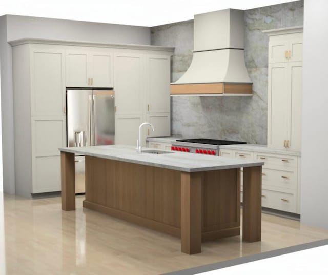 kitchen with a sink, backsplash, stainless steel fridge, cooktop, and custom exhaust hood