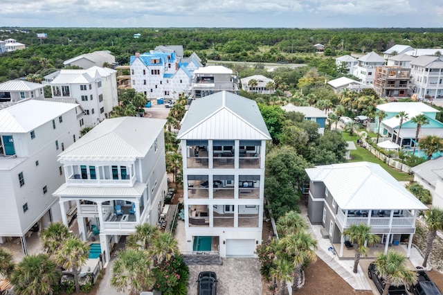 drone / aerial view with a view of trees