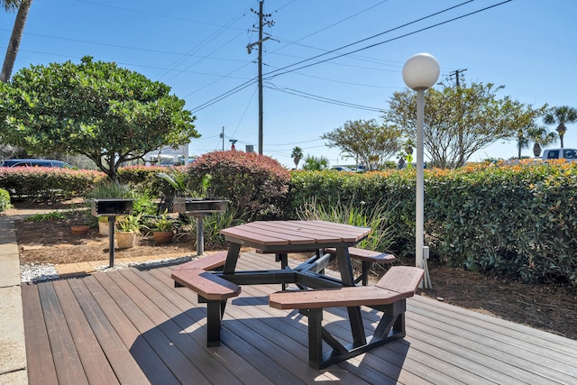 deck with outdoor dining space