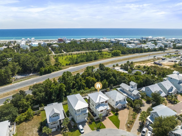 birds eye view of property with a residential view and a water view