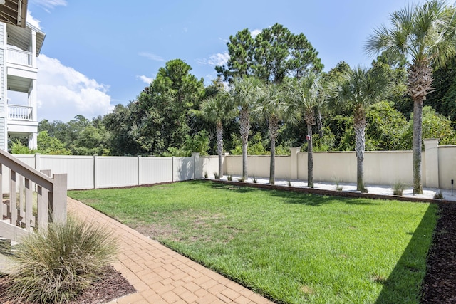 view of yard with a fenced backyard