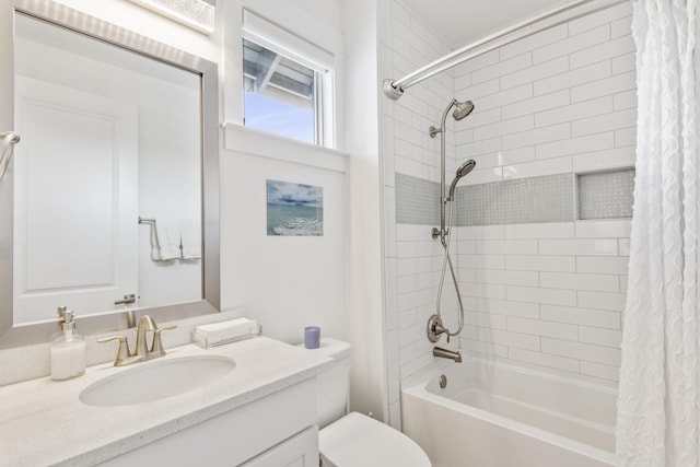 full bathroom featuring shower / bath combo with shower curtain, toilet, and vanity