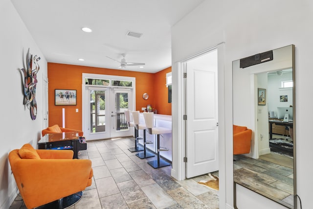 interior space featuring visible vents, baseboards, recessed lighting, french doors, and a ceiling fan