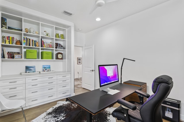 office area with recessed lighting, visible vents, ceiling fan, and light wood finished floors