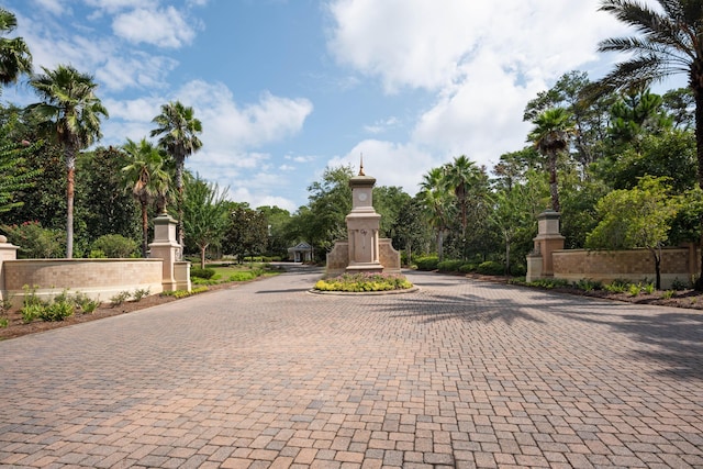 view of gate featuring fence