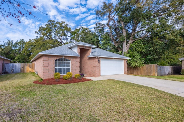 ranch-style home with brick siding, an attached garage, fence, a front yard, and driveway