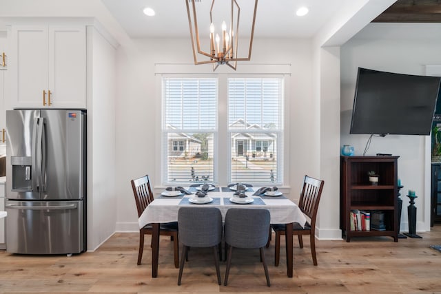 dining area featuring recessed lighting, baseboards, and light wood-style flooring