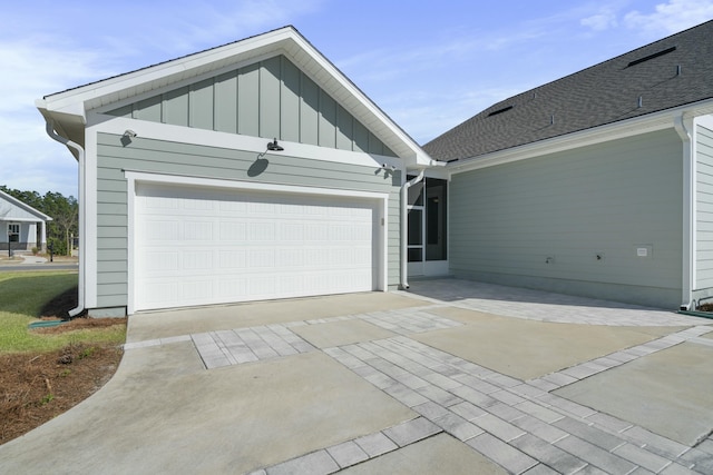 exterior space featuring concrete driveway