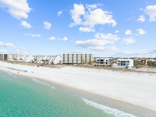 bird's eye view with a view of city, a water view, and a beach view