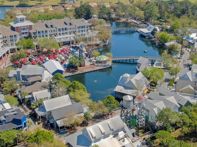 bird's eye view featuring a water view and a residential view