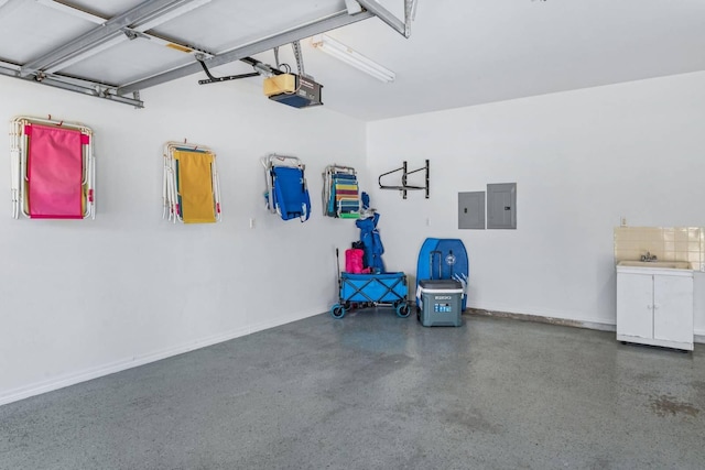 garage with electric panel, baseboards, and a garage door opener