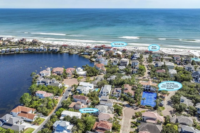 aerial view featuring a water view and a residential view